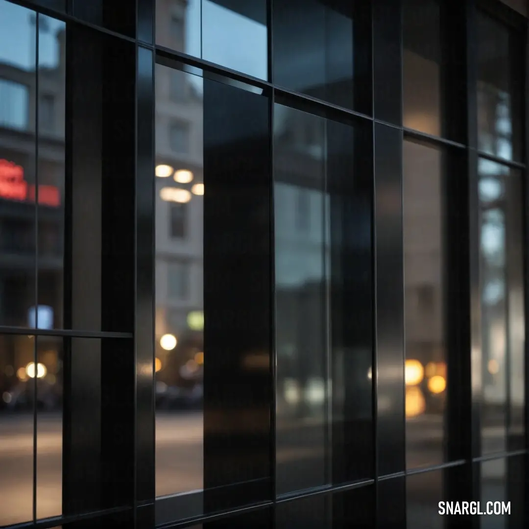 A window beautifully reflects a nearby building and a bustling street, filtering soft light through, where colors blend and create a dynamic atmosphere reminiscent of urban life captured in this CMYK format.