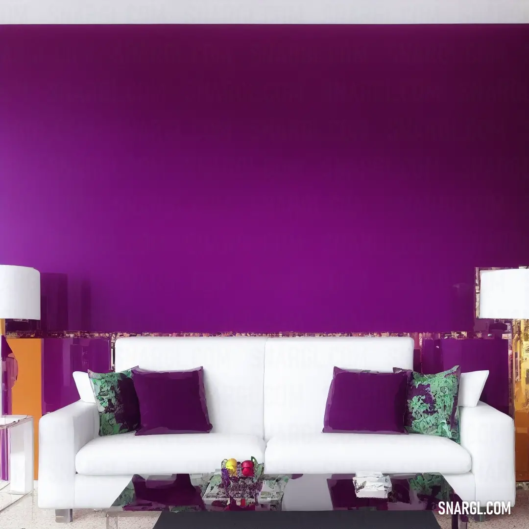 White couch in front of a purple wall with a table and lamp on it and a vase with flowers. Example of RGB 128,0,128 color.