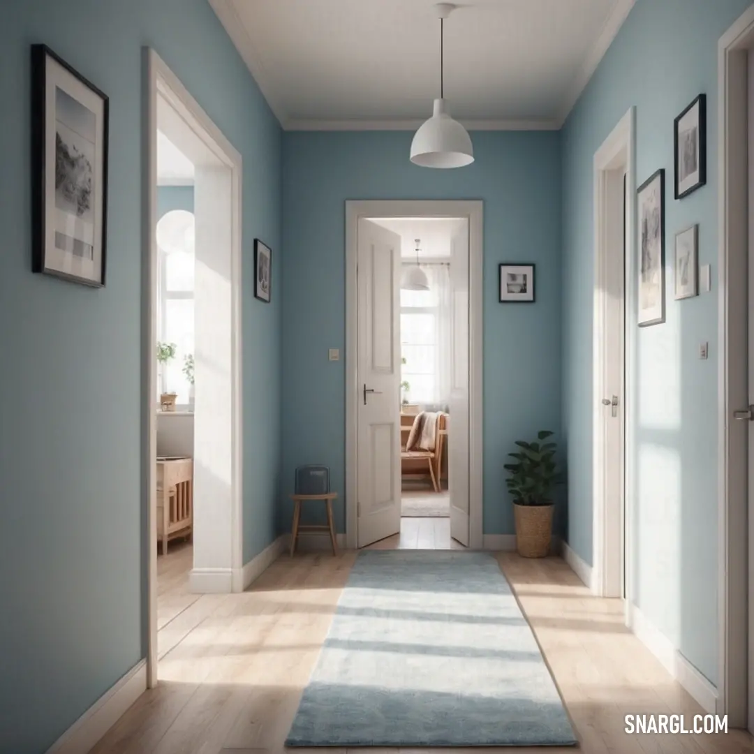 Hallway with a blue wall and a blue rug on the floor and a white door. Color CMYK 0,8,6,0.