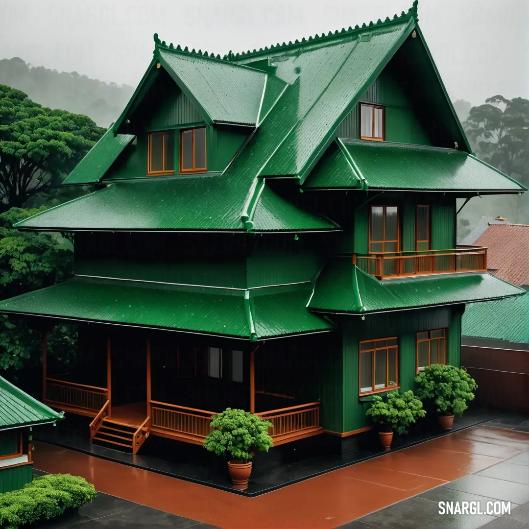 Green house with a green roof and a red floor