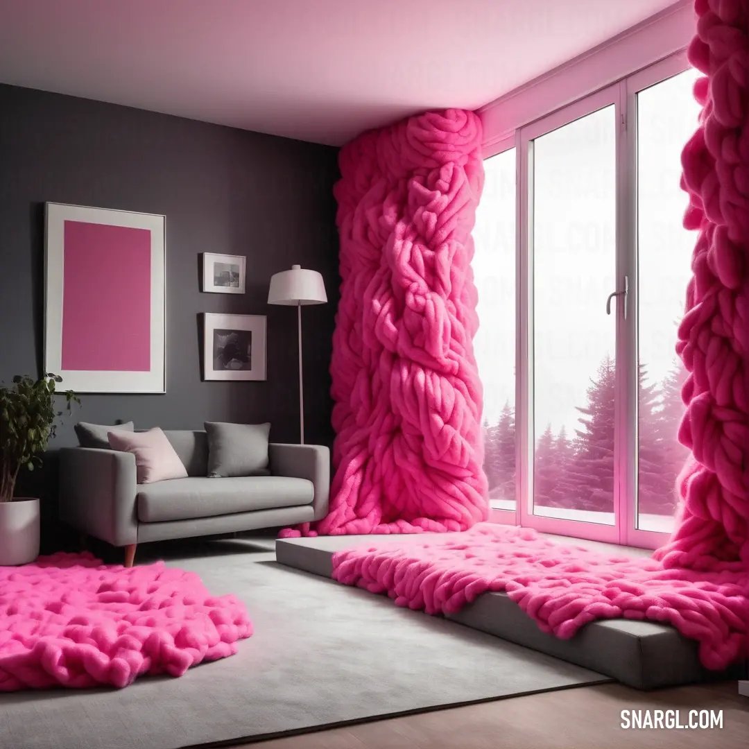 Living room with a pink carpet and a couch and a large window with a view of the woods. Color CMYK 12,100,60,20.