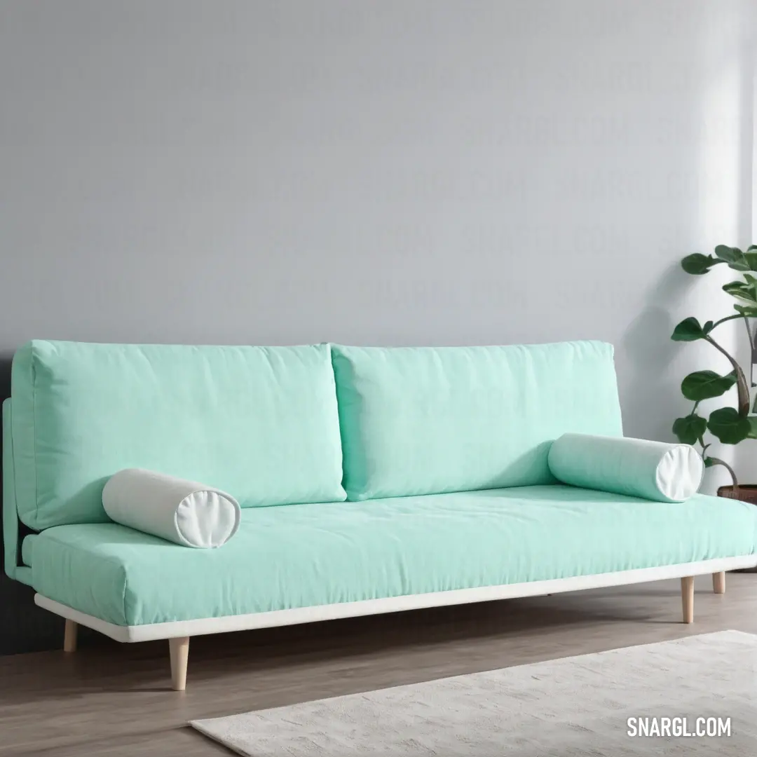 A cozy living space featuring a plush couch adorned with a stylish pillow, complemented by a vibrant potted plant and a soft area rug. Natural light filters through a nearby window, enveloping the room in warmth and serenity.