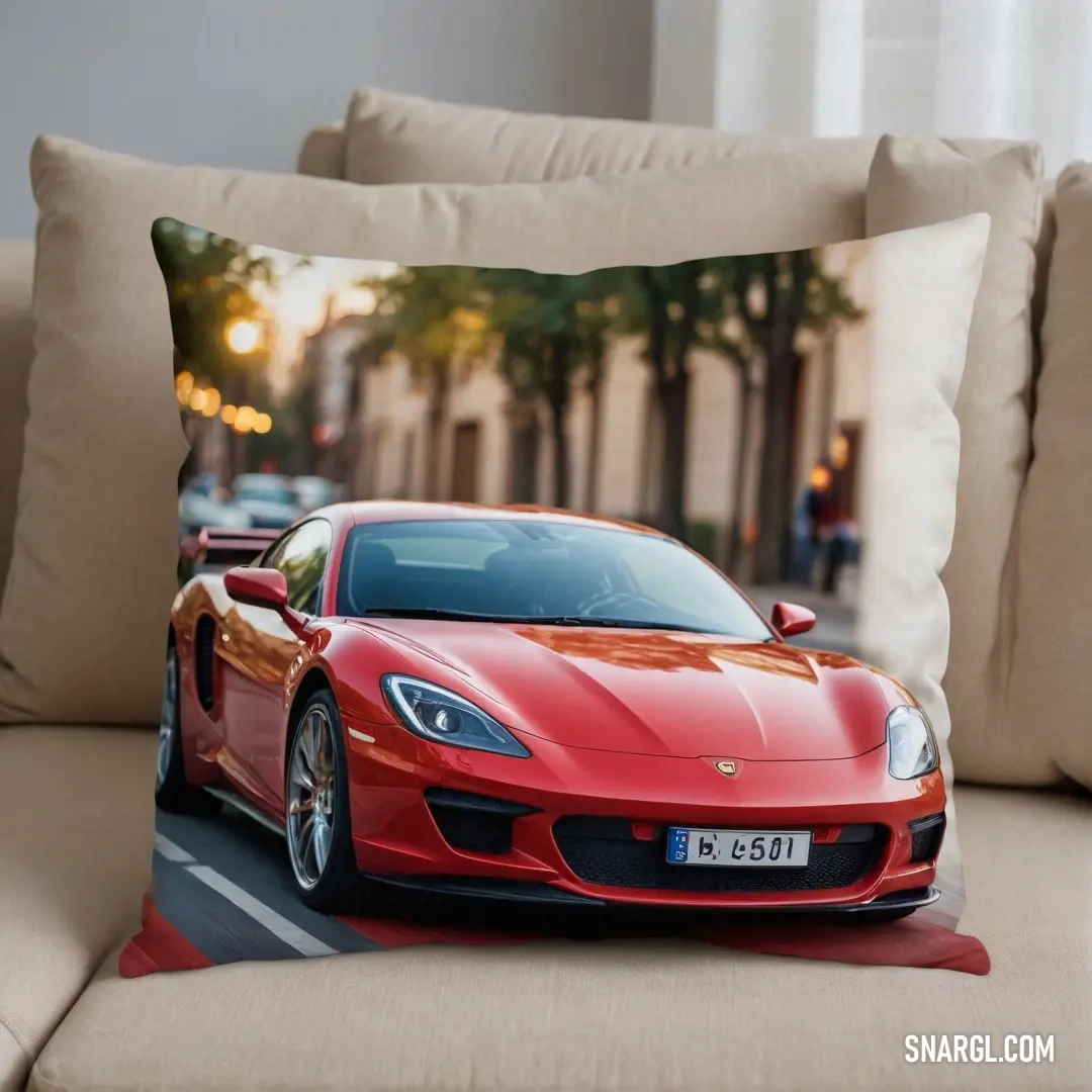 A striking red sports car captured on a city street, its sleek curves showcased on a stylish pillow cover. Set against a cozy couch adorned with a coordinating throw pillow, it merges automotive passion with home decor aesthetics.