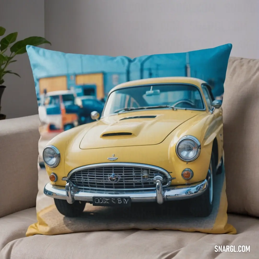 A vibrant yellow car displayed on a plush pillow, surrounded by a lush green plant in the background. The cheerful color and comfy setting create an inviting focal point on the couch, blending nature with automotive charm.