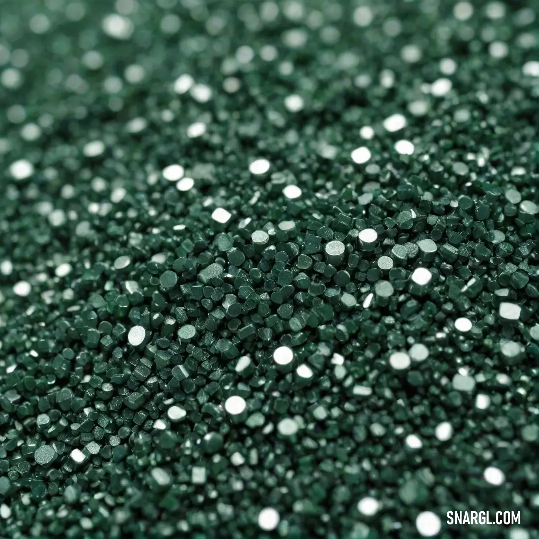 A sparkling green glitter background radiates a vibrant energy, reminiscent of nature's lush surfaces, evoking feelings of growth and revitalization in a dazzling display.