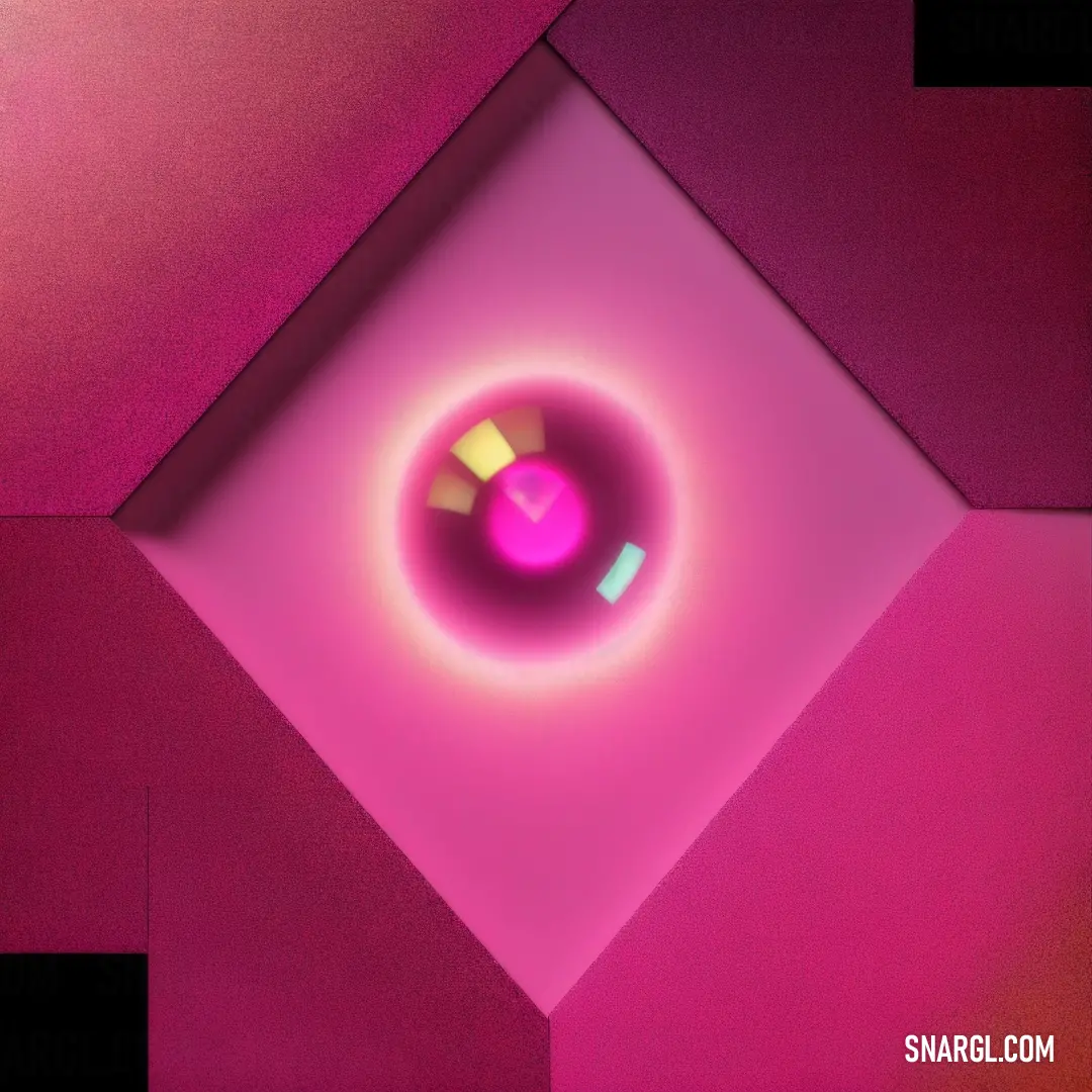 Pink and yellow object with a black background and a pink light in the center of the picture is a circular object