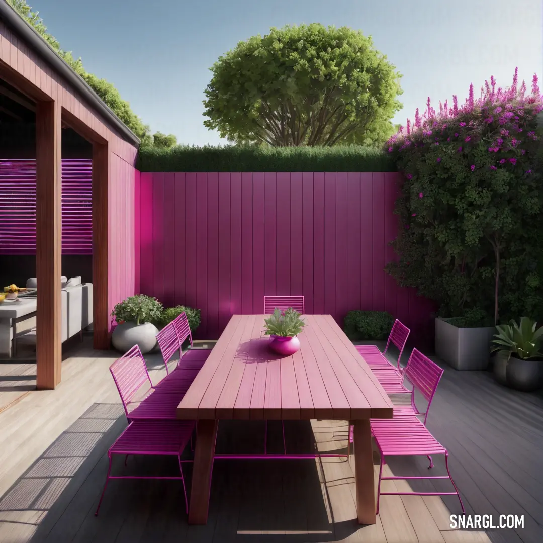 Table and chairs are on a deck with purple walls and a pink table. Color RGB 226,80,152.