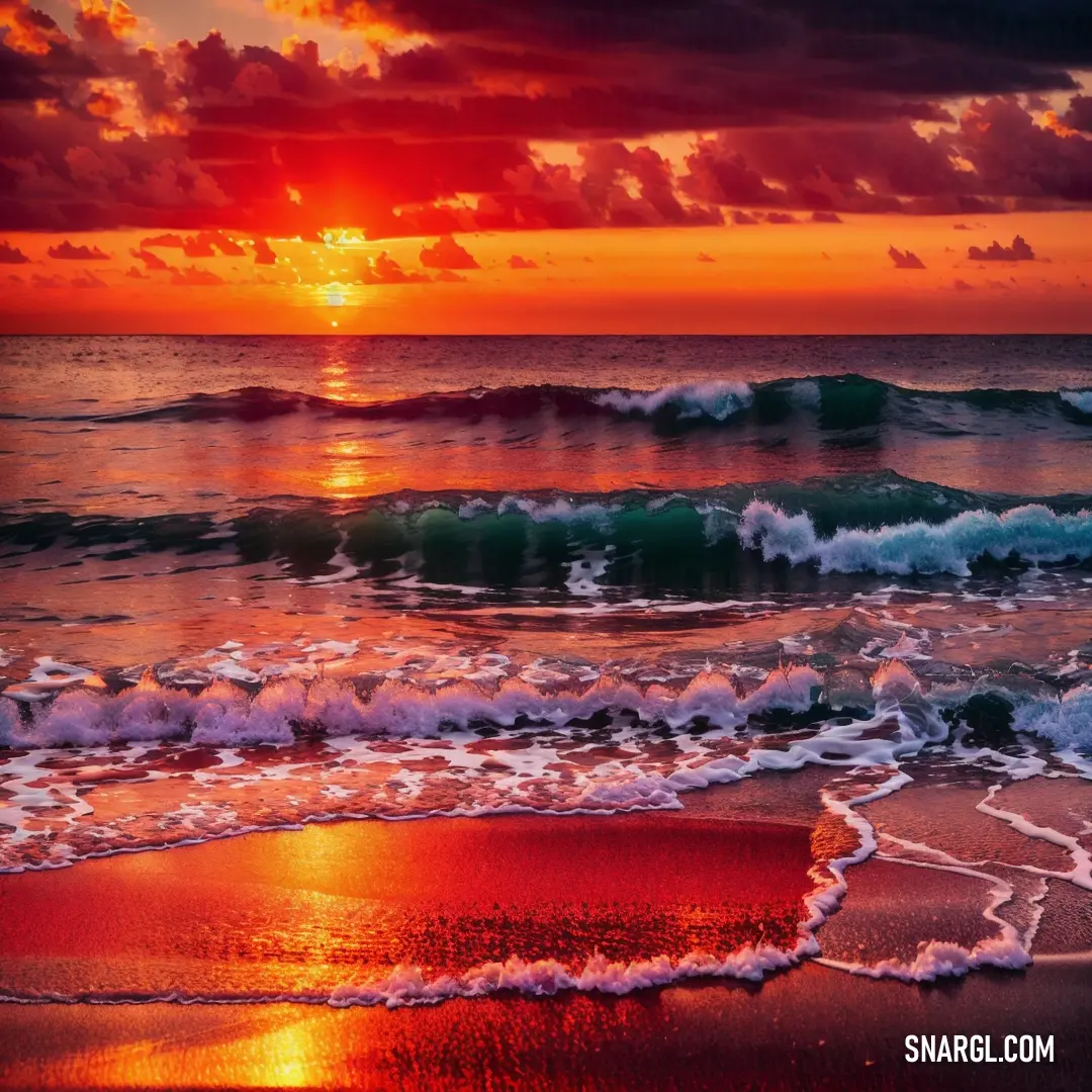 Sunset over the ocean with waves coming in to shore and a red sky with clouds above it and a red and orange sunset