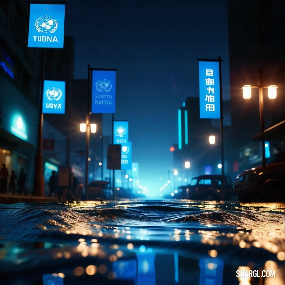 Rich electric blue color. Wet street with a puddle of water on the ground and street lights in the background