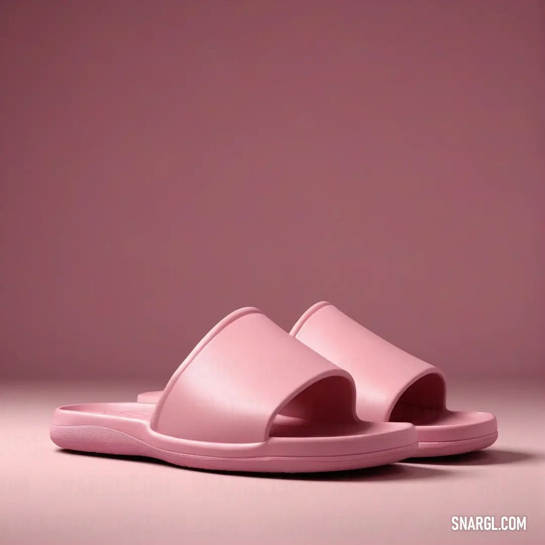 Pink slipper is shown on a pink background. Example of Rose gold color.