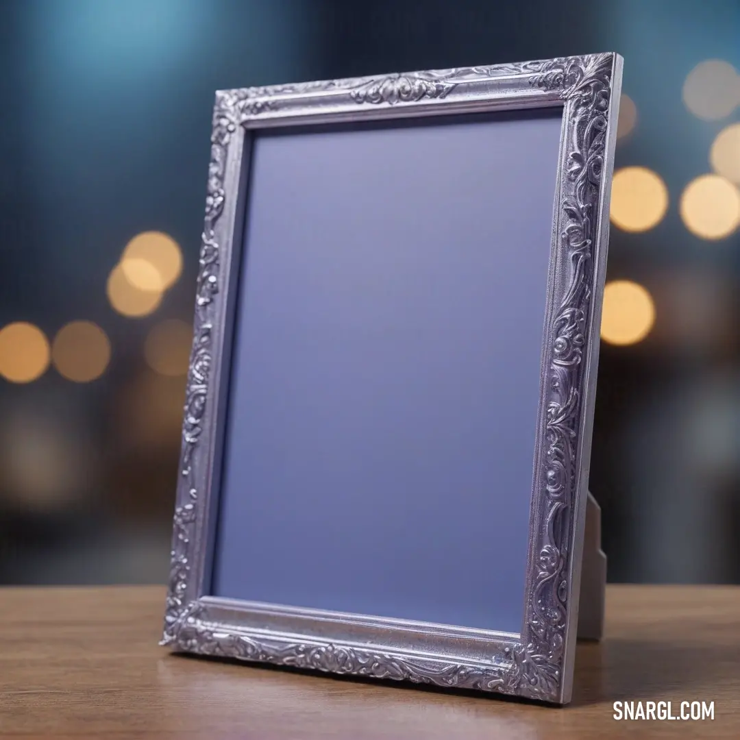 A sleek silver frame resting elegantly atop a rustic wooden table, harmonizing modernity with warmth. The blurred background adds a sense of depth, drawing the eye to this stylish centerpiece.