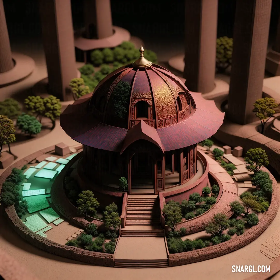 Model of a building with a circular roof and a staircase leading to the top of it and a green light in the middle