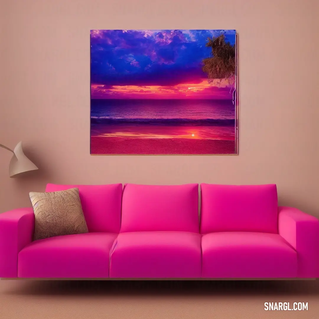 Pink couch in a living room with a painting on the wall above it and a lamp on the side