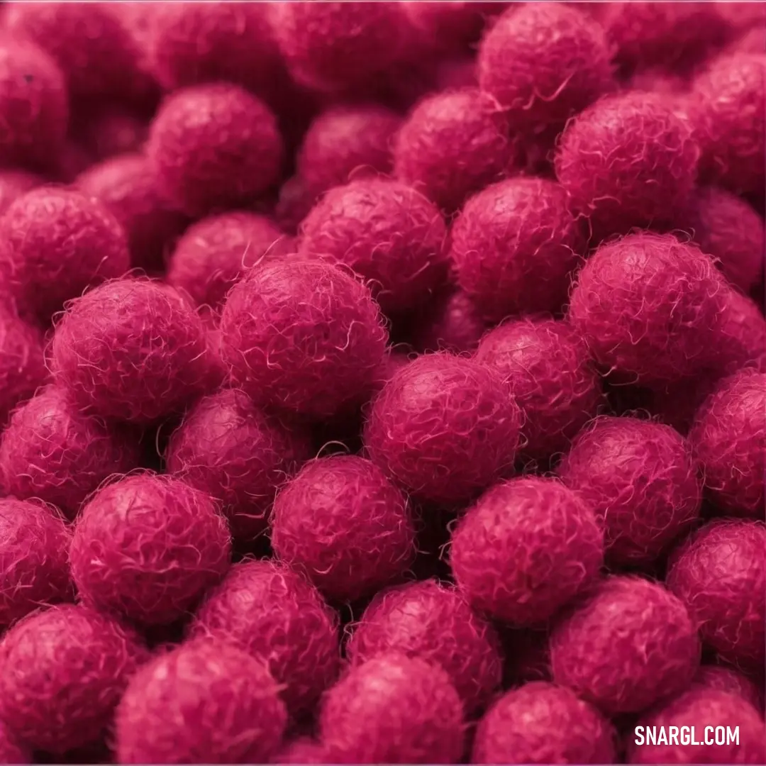 A captivating scene of a pile of red yarn balls stacked together on a rustic tabletop, presenting a cozy atmosphere that evokes creativity and warmth, perfect for crafting enthusiasts who appreciate vibrancy.