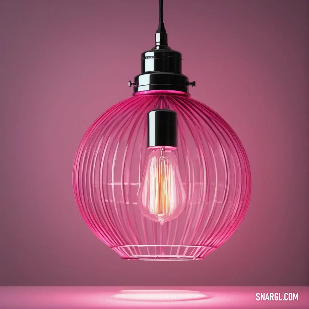 A whimsical pink light bulb gracefully hanging from a ceiling fixture, set against a cheerful pink background. This unique design element adds a playful touch to any room, merging functionality with delightful aesthetics.