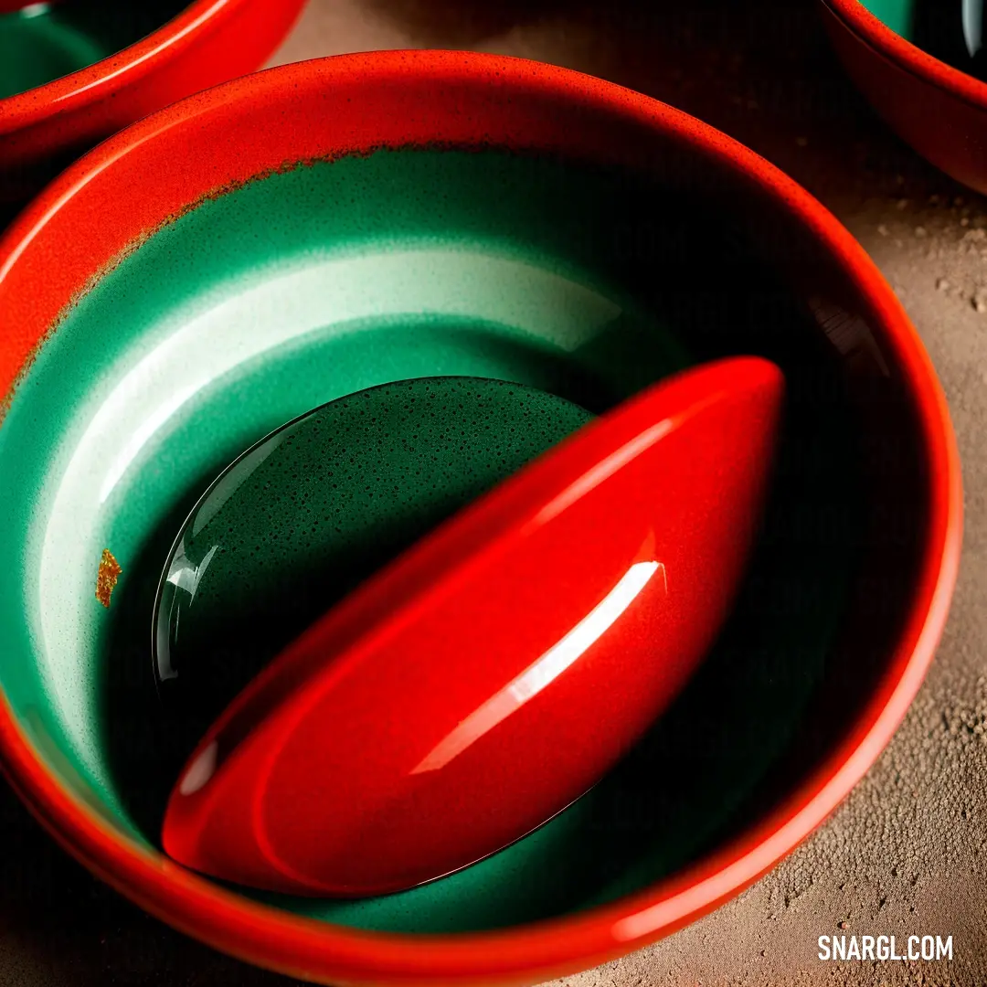Ruddy color example: Red and green bowl with a red lid and a green bowl with a red lid and a green bowl