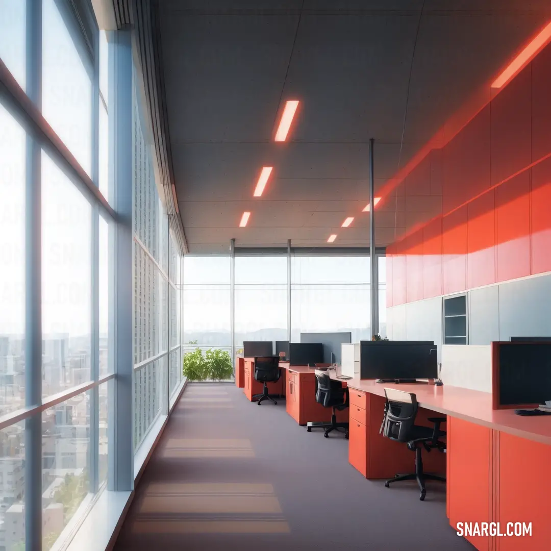 Long row of desks in an office with a view of the city outside the window and a skylight