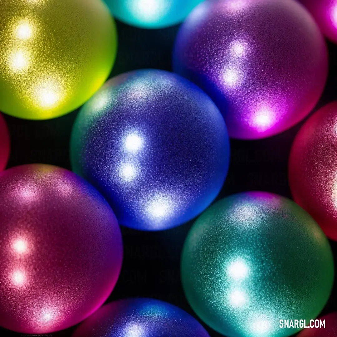 Bunch of shiny balls are in a circle together on a black background with a black background and a white border