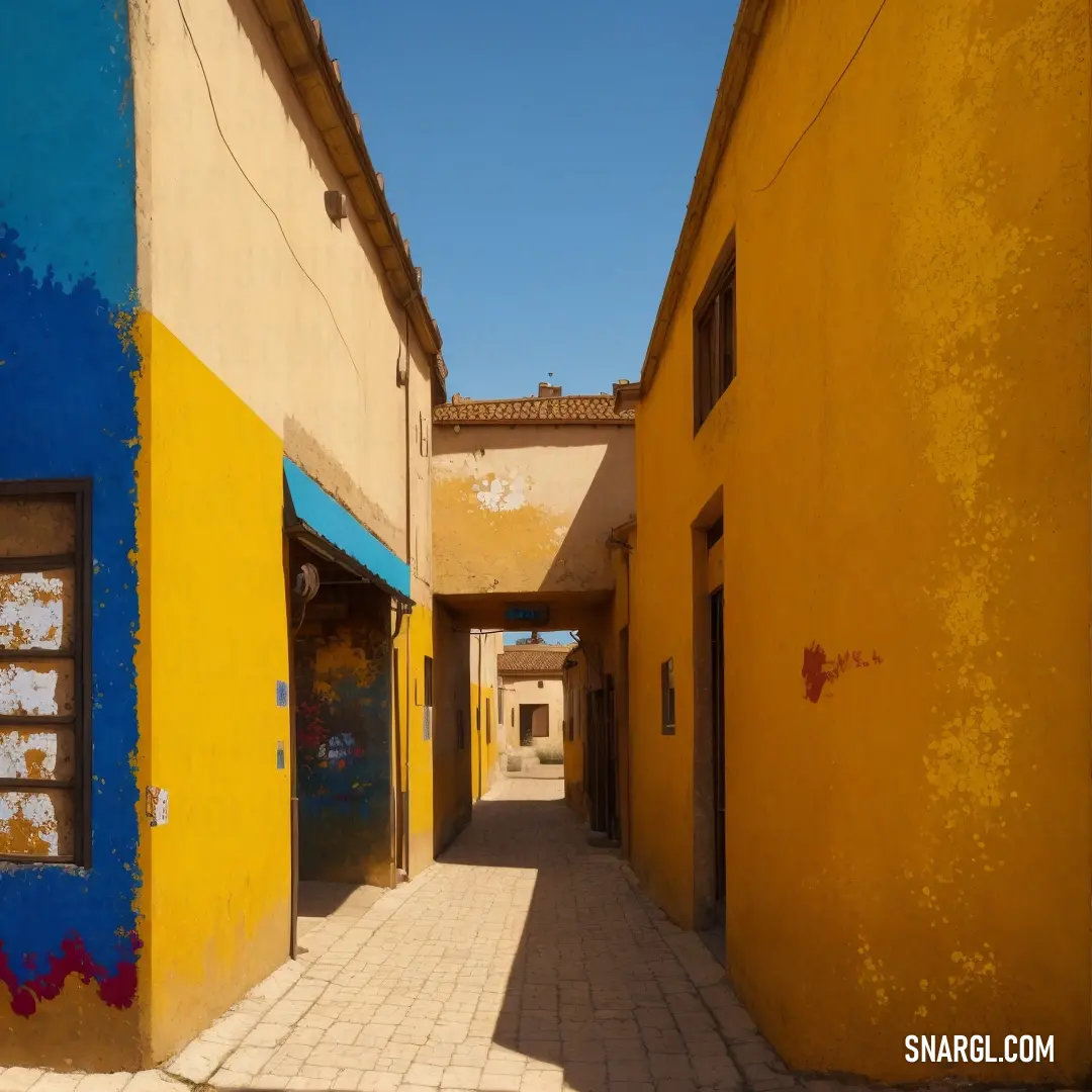 Narrow alley with a blue and yellow building on the side of it and a blue awning over the doorway