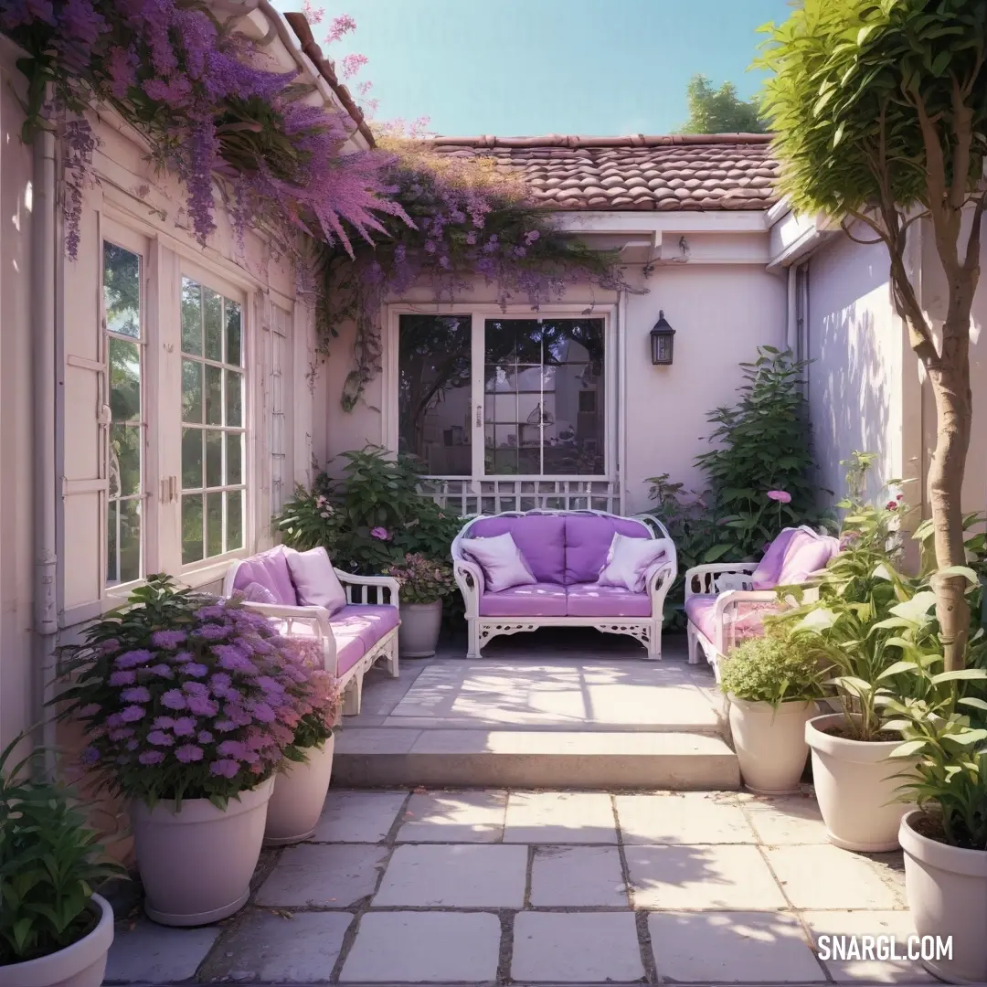 Patio with a couch and chairs and potted plants on the side of the house and a door. Example of CMYK 0,4,7,0 color.
