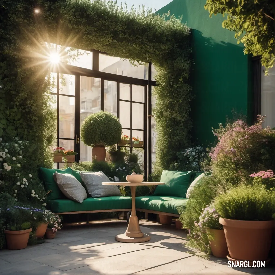 Green couch in a lush green room next to a window with a view of the outside of the room. Example of Sepia color.