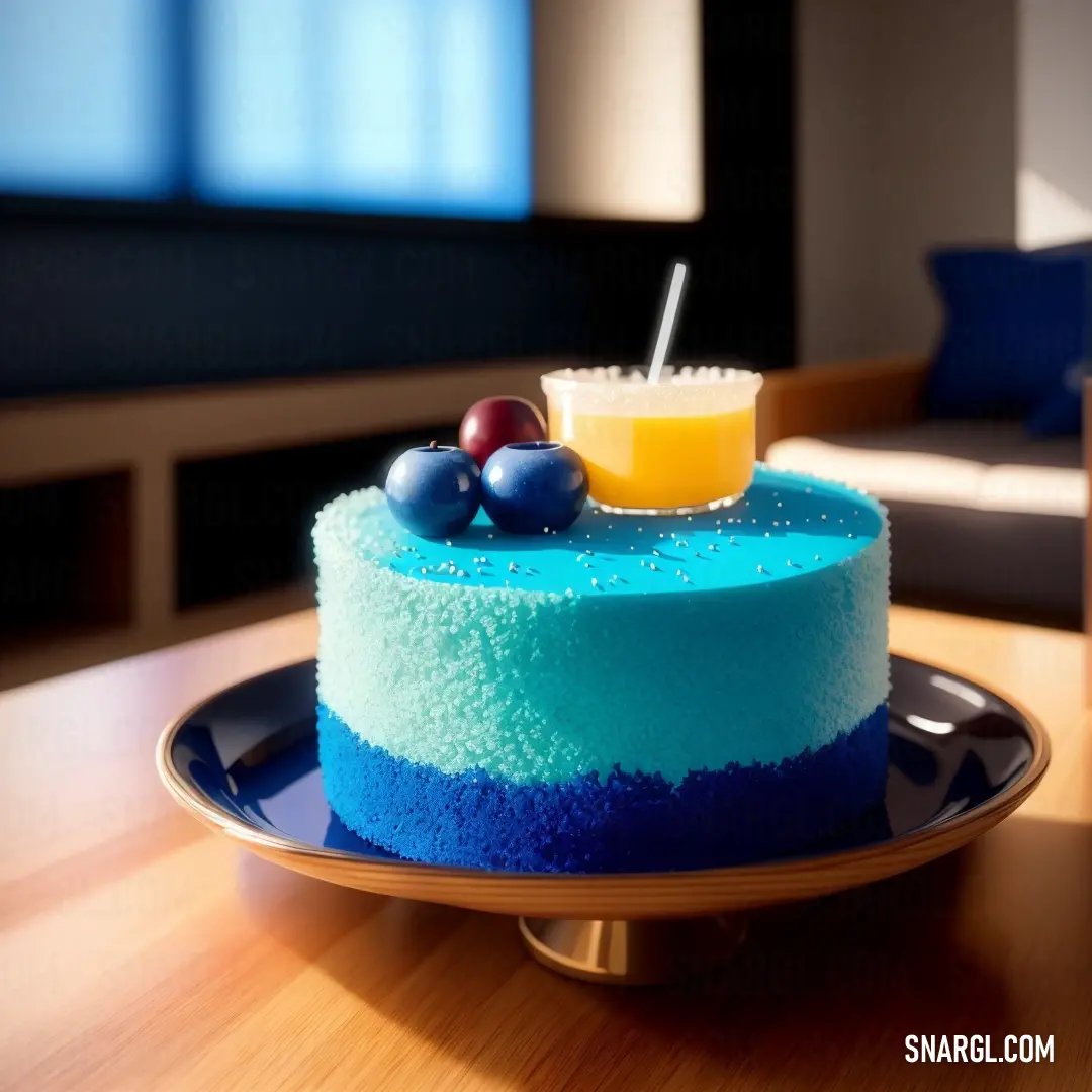 Blue cake with a blue layer and a blue and white frosting on a plate with a glass of orange juice