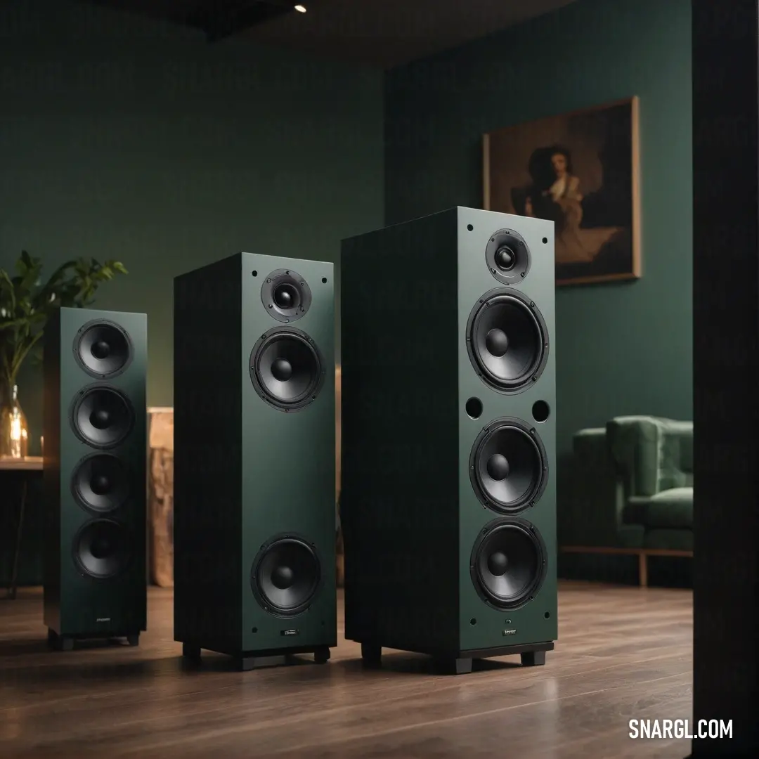 Stylish pair of speakers positioned on a rustic wooden floor near a vibrant green chair and an artistic painting. This lively setup adds a splash of color and energy to the serene ambiance of the room.