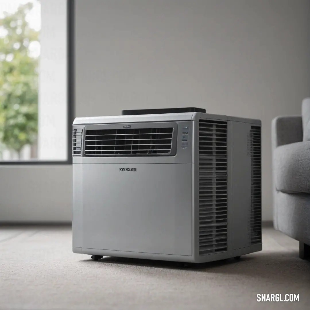 A compact air conditioner positioned on a stylish wooden floor, framed by a cozy couch and a sunny window. This setting combines comfort and refreshing coolness, perfect for warm days.