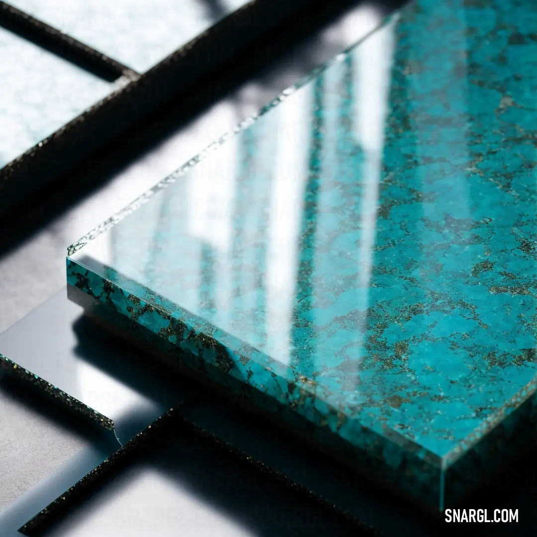 Close up of a table with a blue marble top and a black metal base