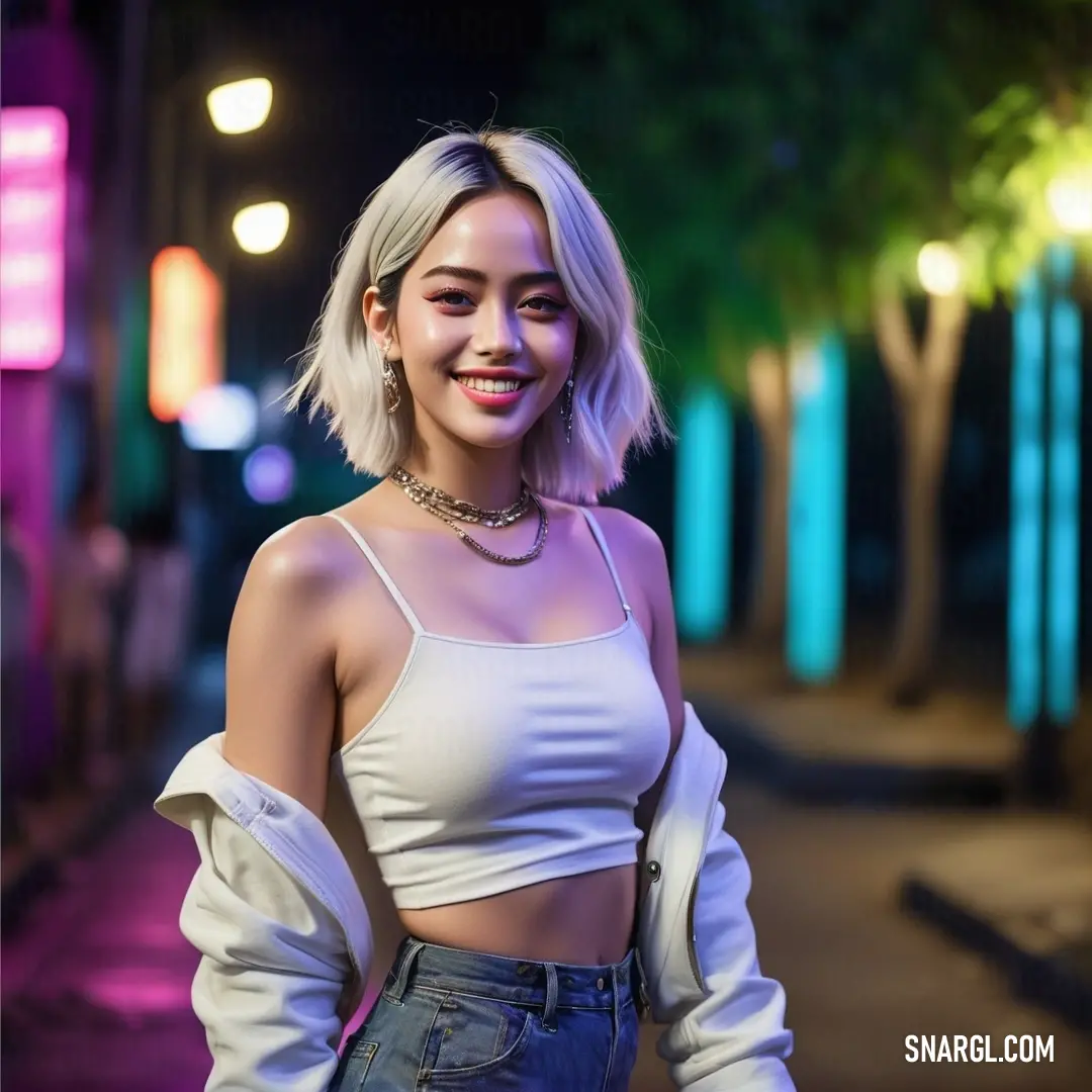 Woman with blonde hair and a crop top posing for a picture in the street at night with a neon light