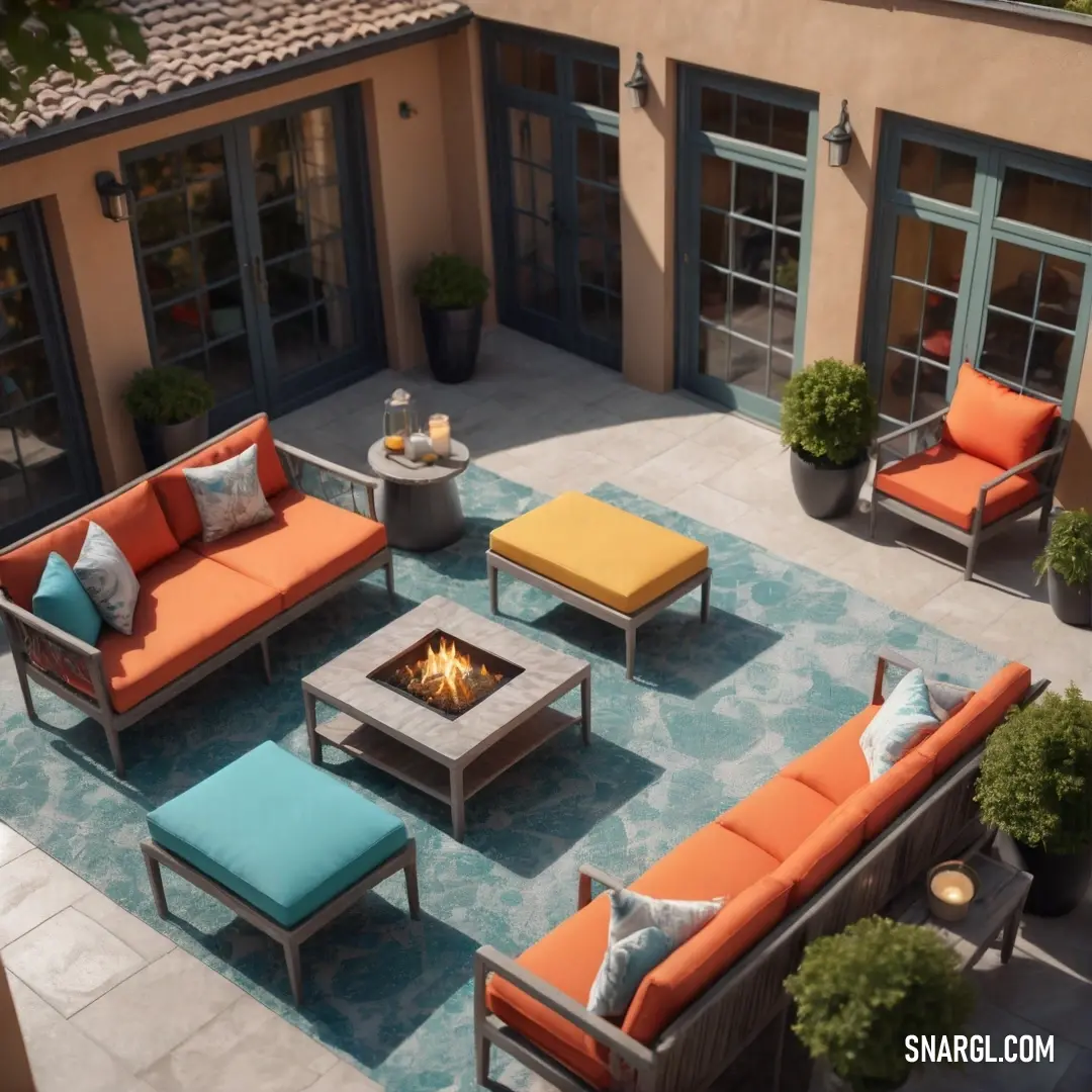 Patio with a fire pit and seating area with potted plants. Example of Sunset Orange color.