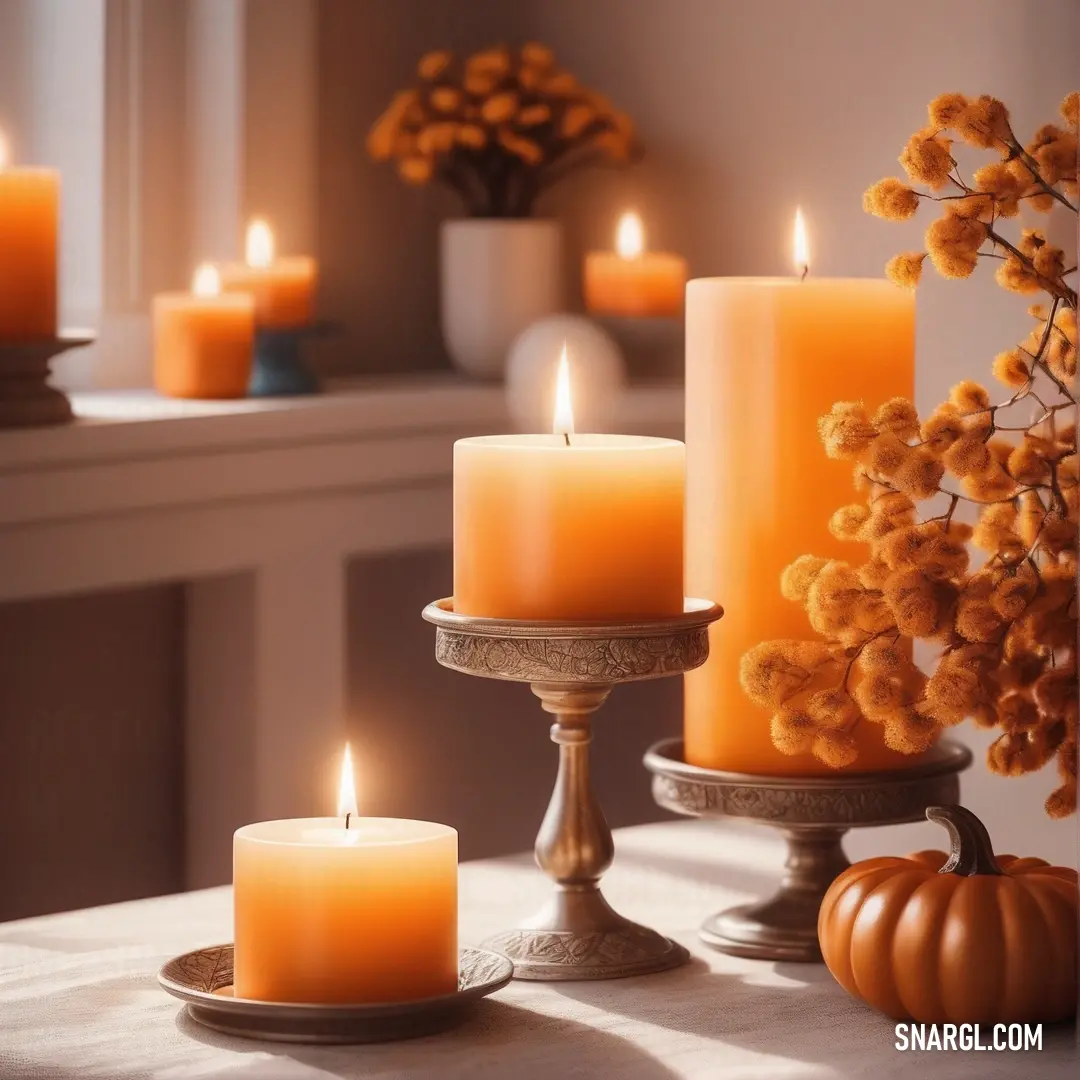 Table topped with candles and a vase filled with flowers and pumpkins next to a window sill. Color RGB 205,87,0.