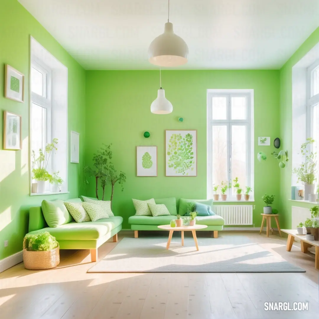 Living room with green walls and a white ceiling fan and a green couch and chair and coffee table. Color RGB 208,240,192.