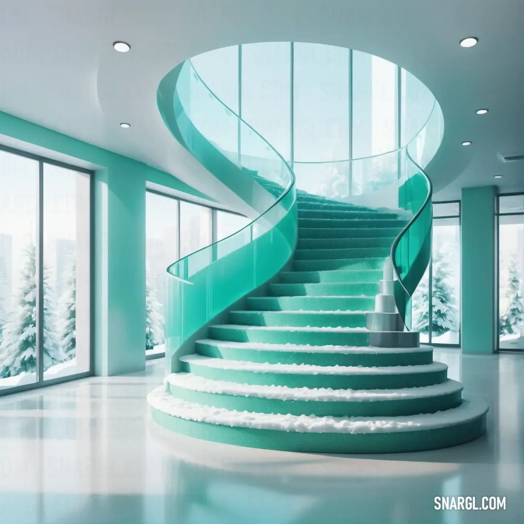 Spiral staircase in a modern building with a view of the snow covered trees outside the window and a large window