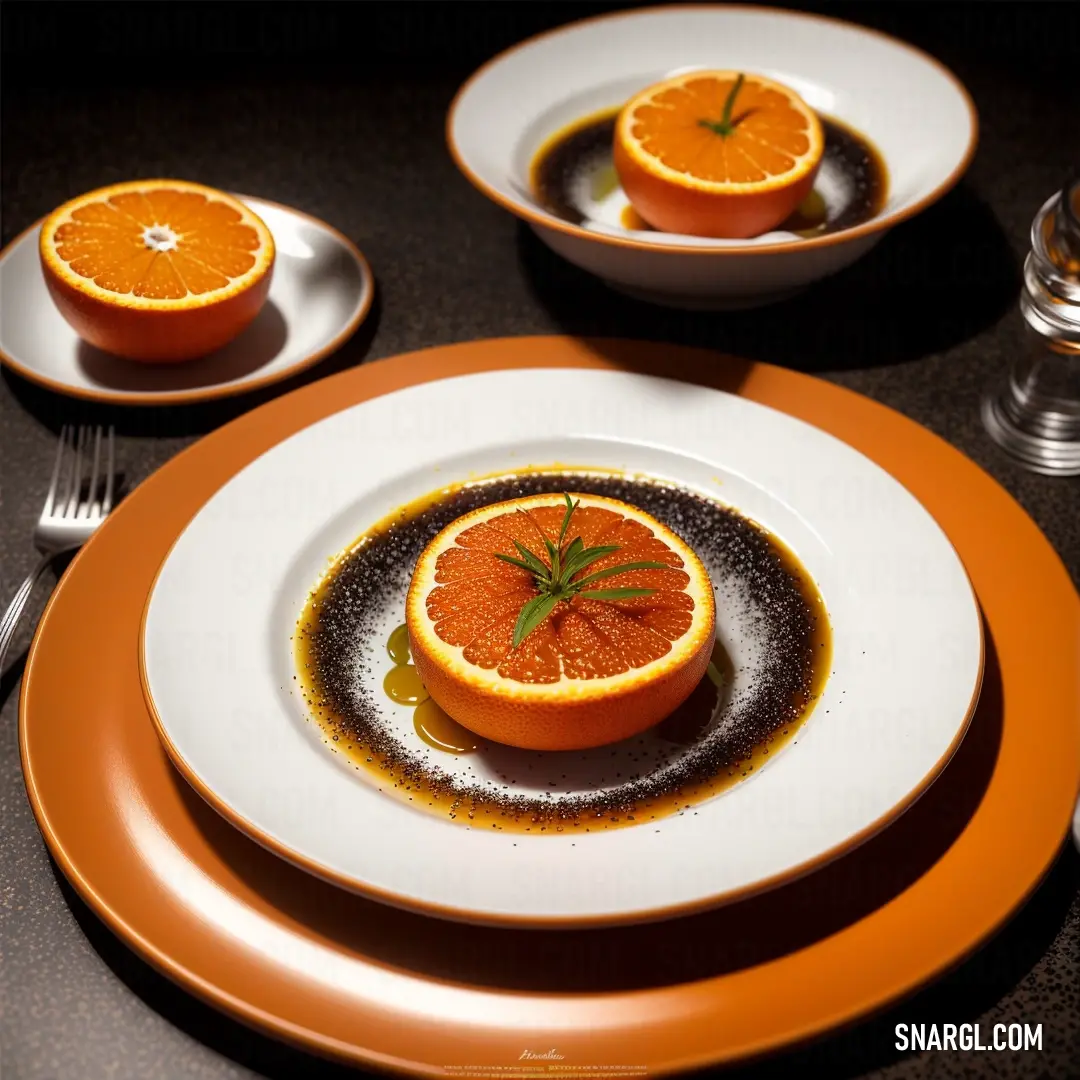 Tenne color example: Plate with an orange cut in half on it and a fork and knife on the side of the plate