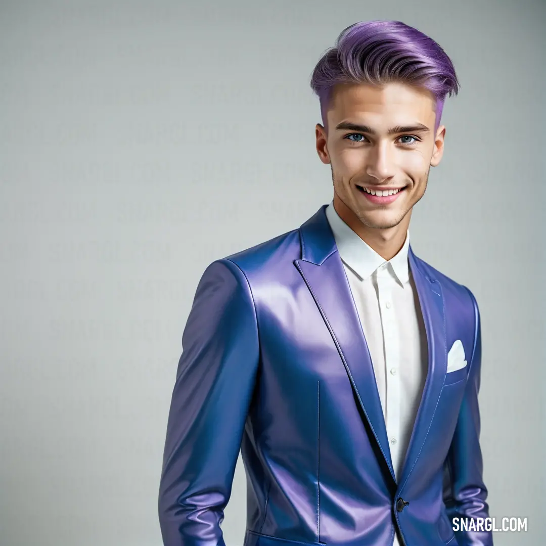 Man with a purple suit and white shirt smiling at the camera with his hands in his pockets. Color #746CC0.