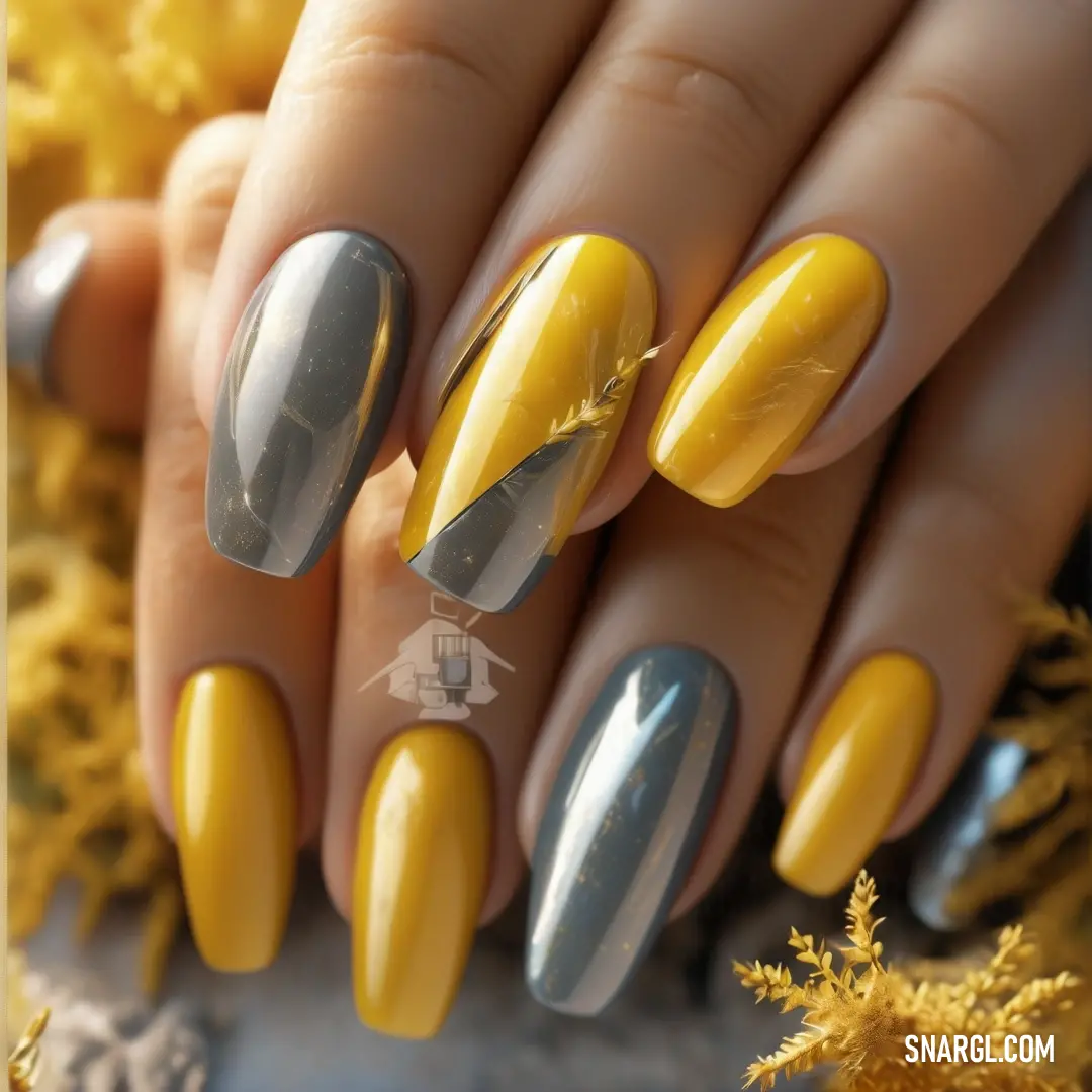 Woman with yellow and silver nails with a yellow and silver nail polish on it's nails and a yellow. Example of CMYK 0,0,0,50 color.