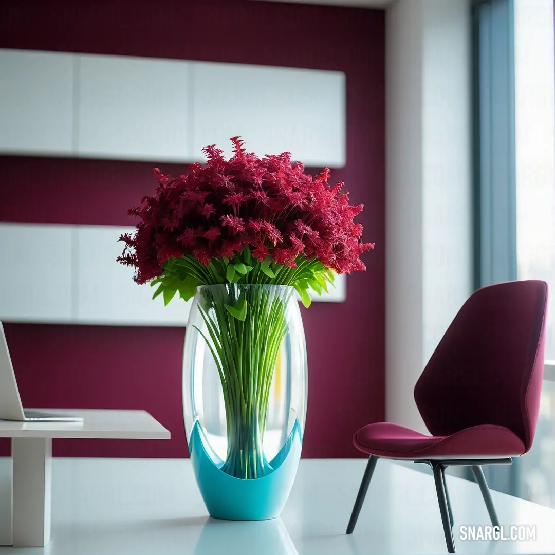 Vase with flowers in it on a table next to a chair and a window with a view of a city. Example of Tyrian purple color.