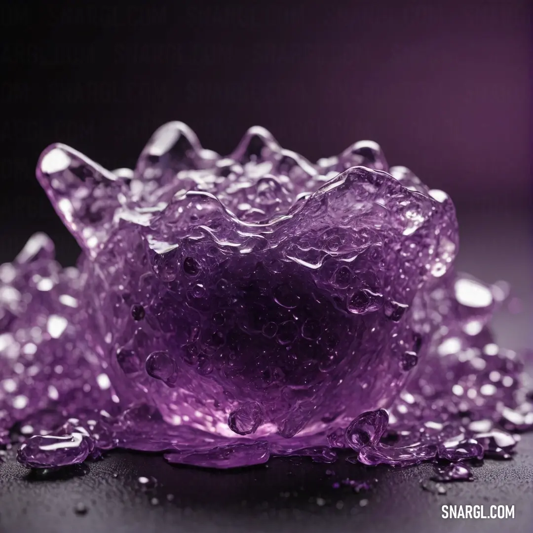 A vibrant ube-colored object, softly shimmering with bubbles atop a smooth tabletop, set against a matching purple background. The rich hue of purple gives off an inviting, serene vibe.