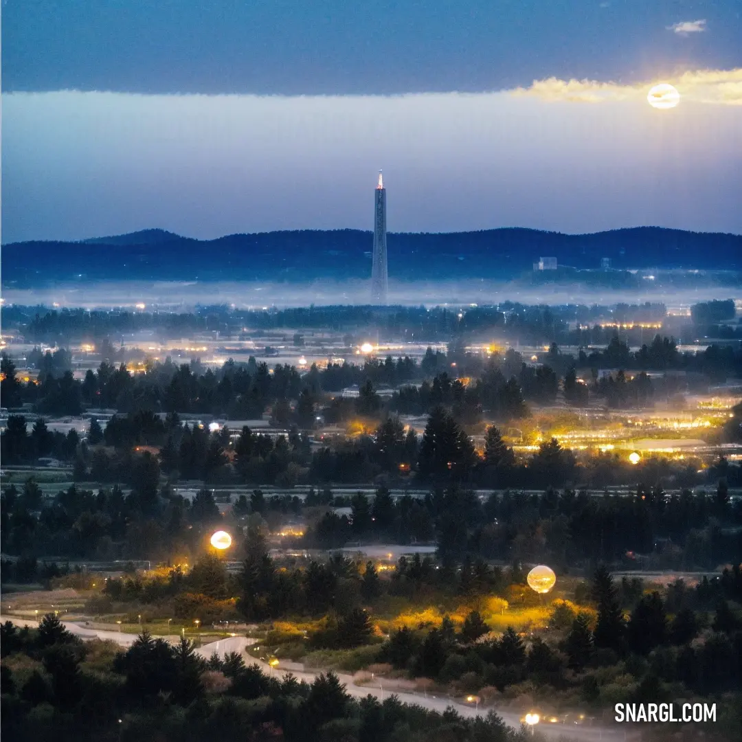 A foggy cityscape at night, with a distant tower illuminated by lights and a quiet atmosphere, evoking a sense of mystery and calm as the city glows under a misty sky.