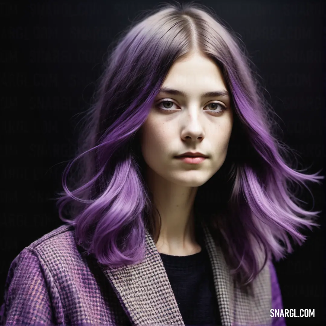 Woman with purple hair and a jacket on a black background