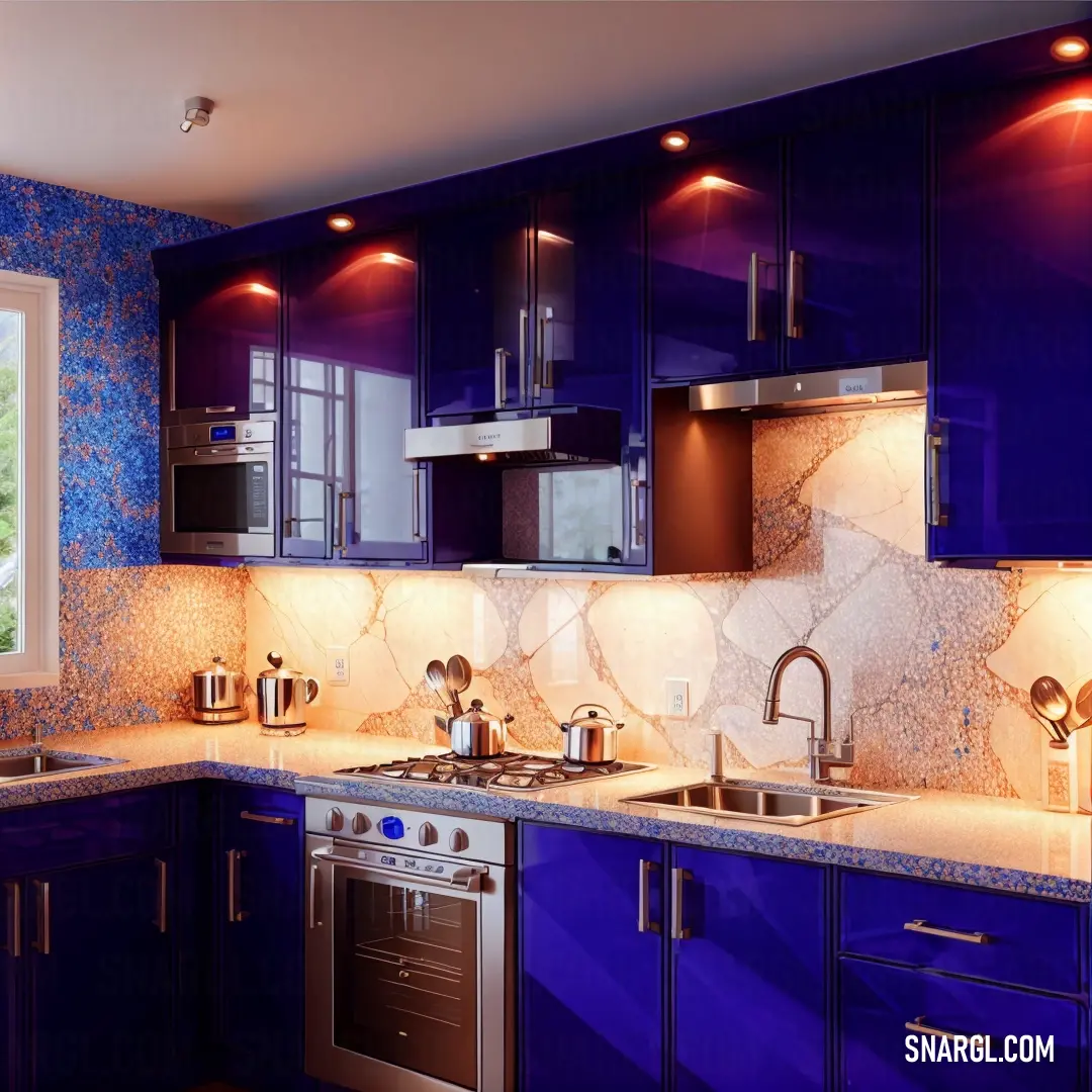 Kitchen with blue cabinets and a window in the corner of the room with a sink and stove in it. Color Ultramarine.