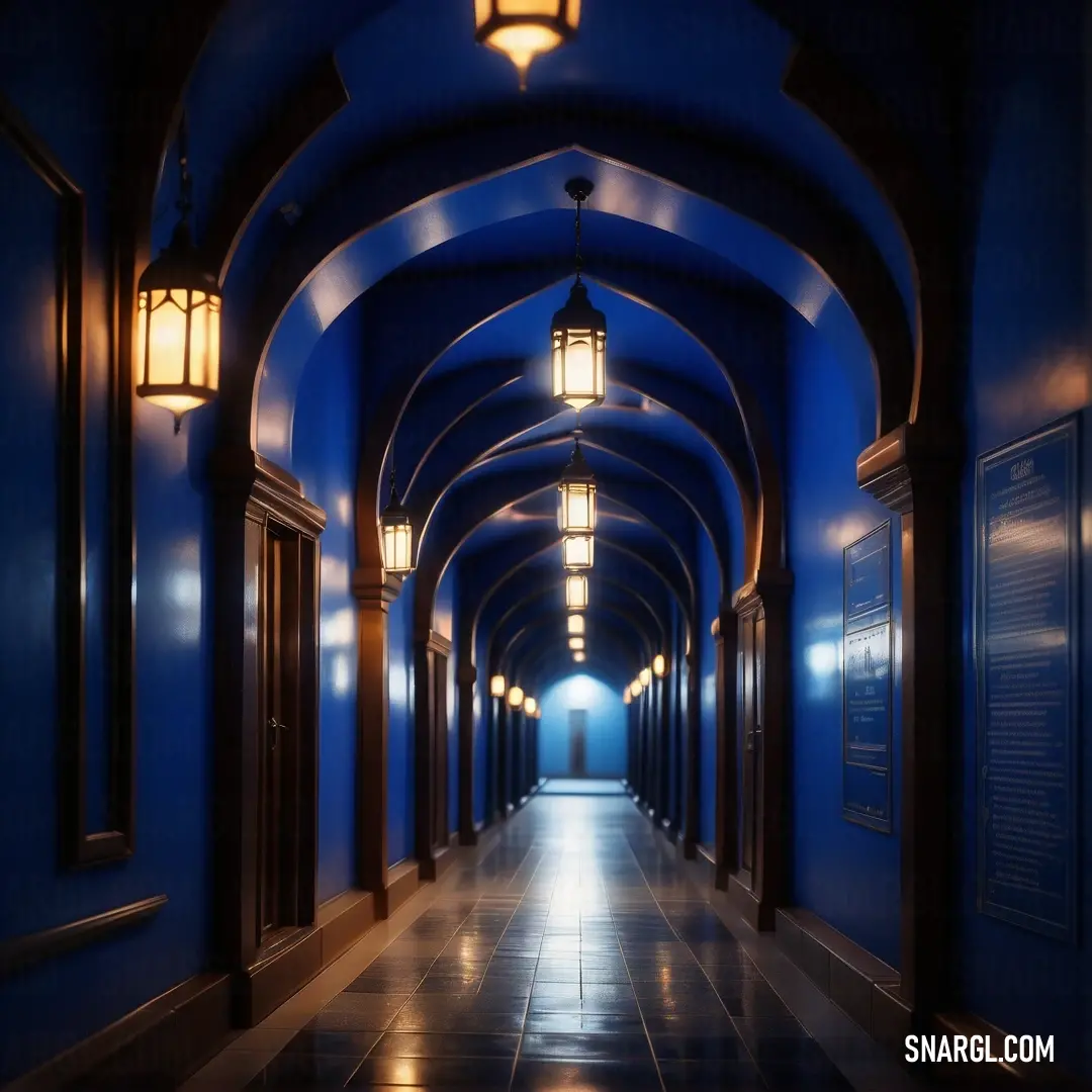 Long hallway with a blue ceiling and a light on the ceiling and a couple of lights on the wall. Example of RGB 18,10,143 color.