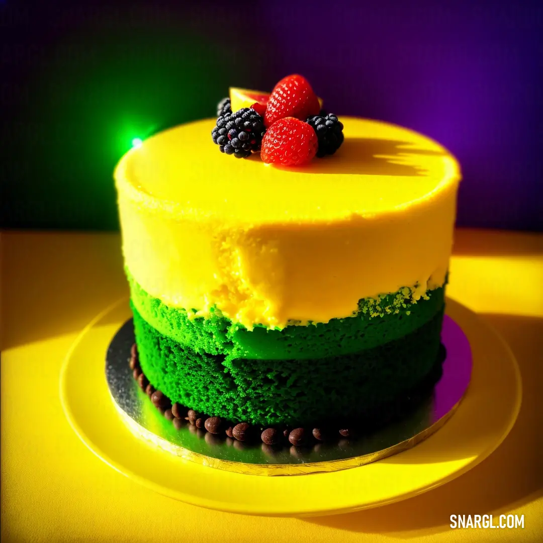 Cake with a yellow and green frosting and raspberries on top of it on a plate
