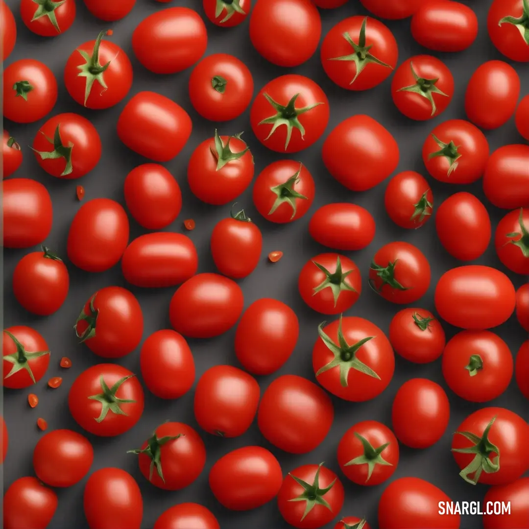 A stunning arrangement of luscious tomatoes artfully laid out against a sleek black background, perfectly contrasting their vibrant red hues. This display not only displays freshness but showcases the appeal of simple, natural beauty.