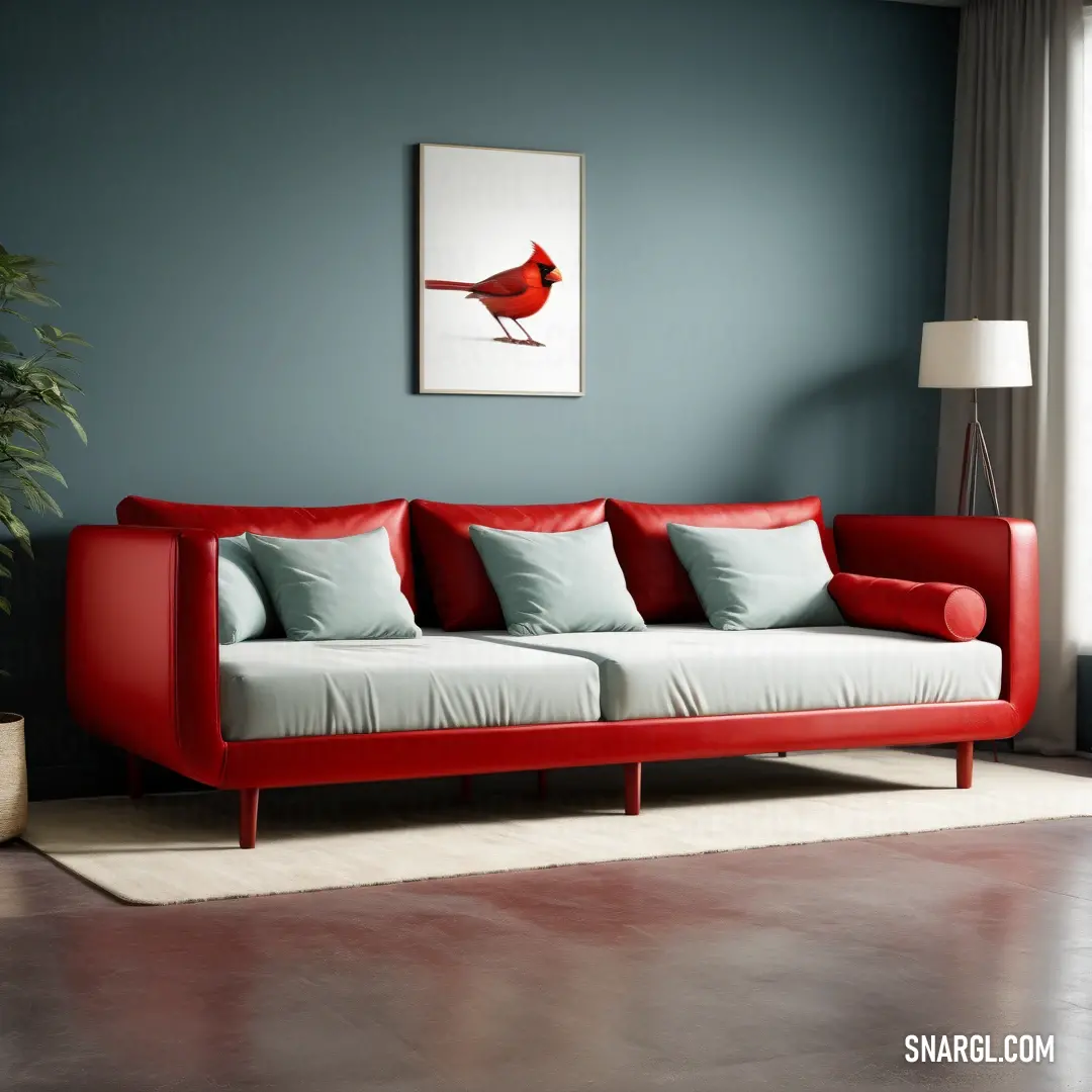 Red and white couch in a living room next to a window with a painting on the wall. Color RGB 153,0,0.