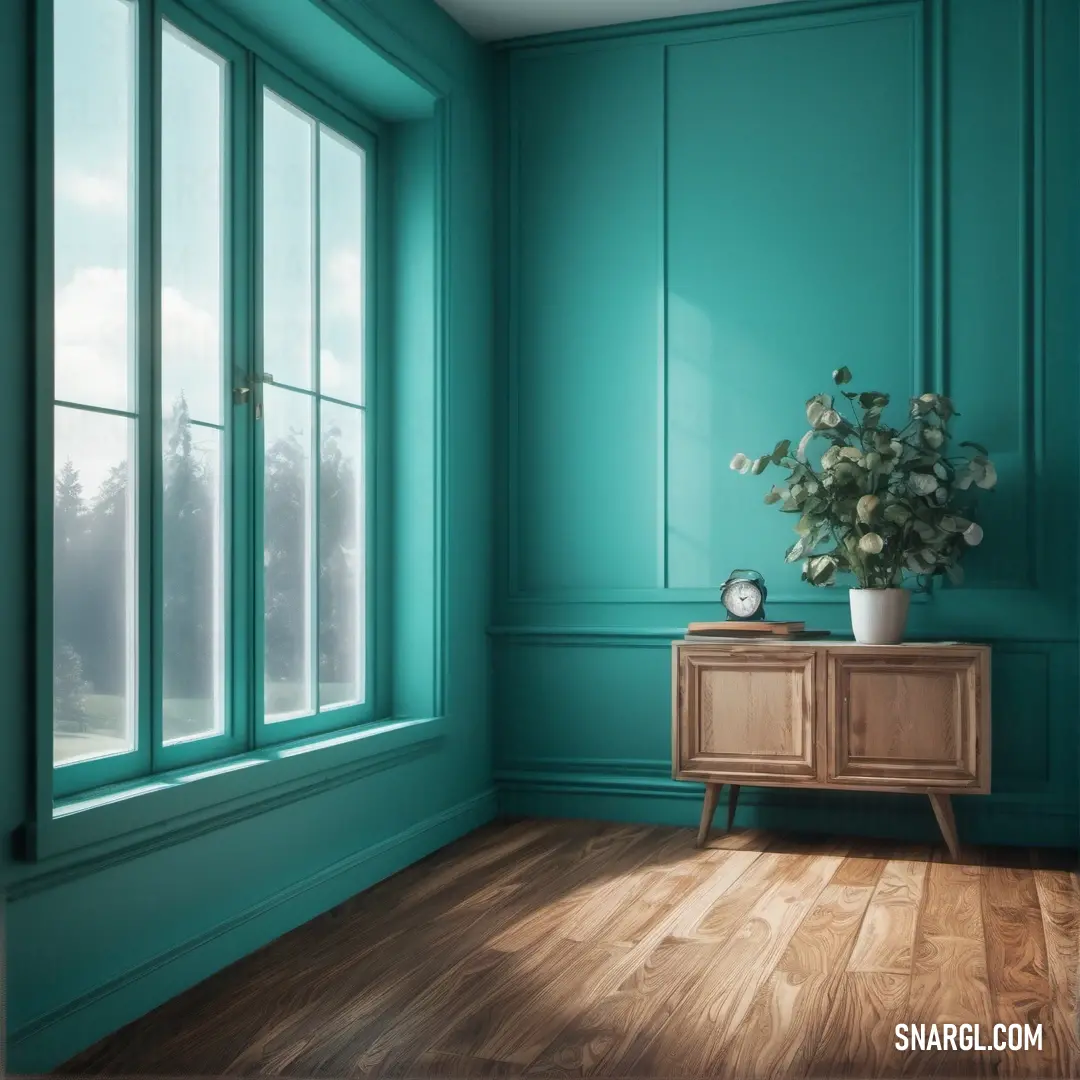 A room with a wooden floor and verdigris-green walls, featuring a potted plant on a table in front of a large window. The space is bright and airy, offering a peaceful environment with a touch of nature.