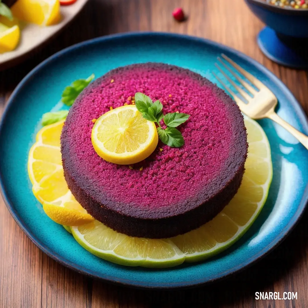 Blue plate topped with a purple cake and a slice of lemon on top of it next to a fork