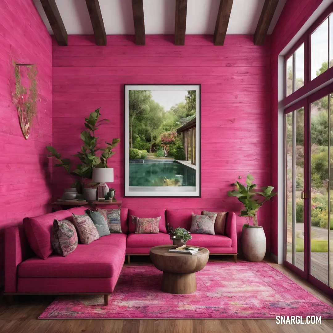 Living room with pink walls and a painting on the wall above the couches and a rug on the floor. Example of RGB 247,83,148 color.