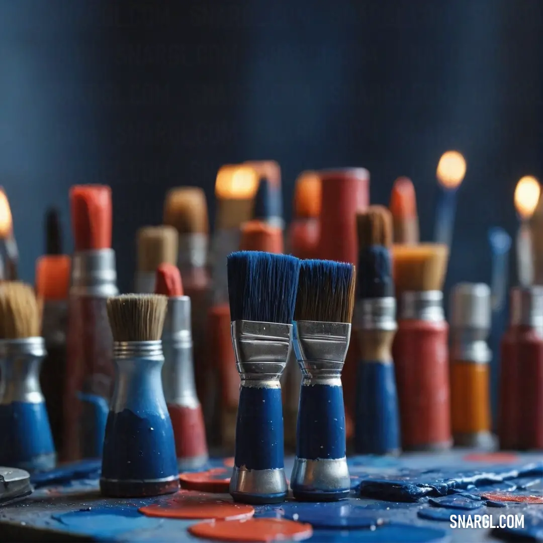 A captivating close-up of paintbrushes resting on a well-worn table, showcasing a vivid auburn hue that speaks to the creativity and passion of the artist at work.